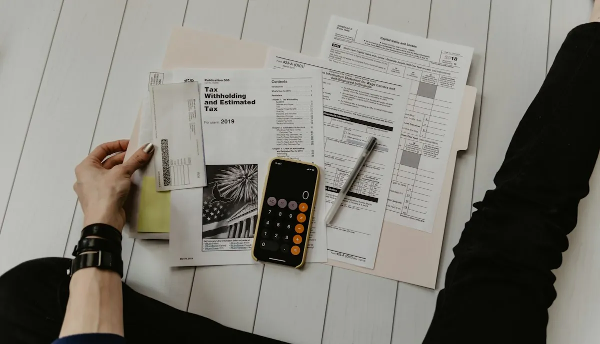 Working through invoices at a kitchen table